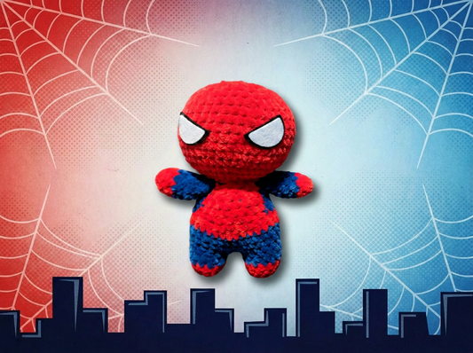 Shop a handmade crocheted spider-hero plushie—10” tall and 8” wide. A soft, cute crochet toy for superhero fans, kids, and gift-giving.
